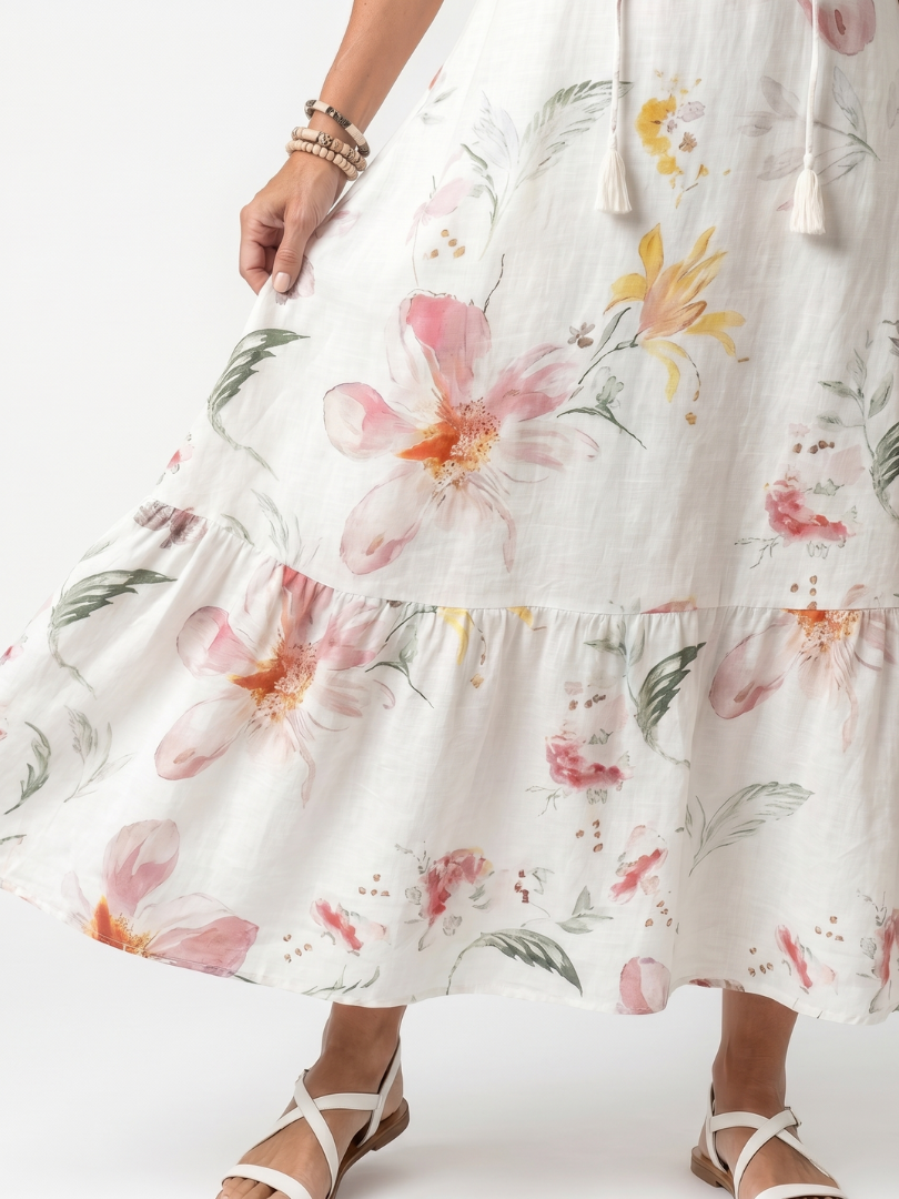 Noa | Vestido midi con volantes y pompones, con un suave estampado floral