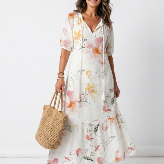 Noa | Vestido midi con volantes y pompones, con un suave estampado floral